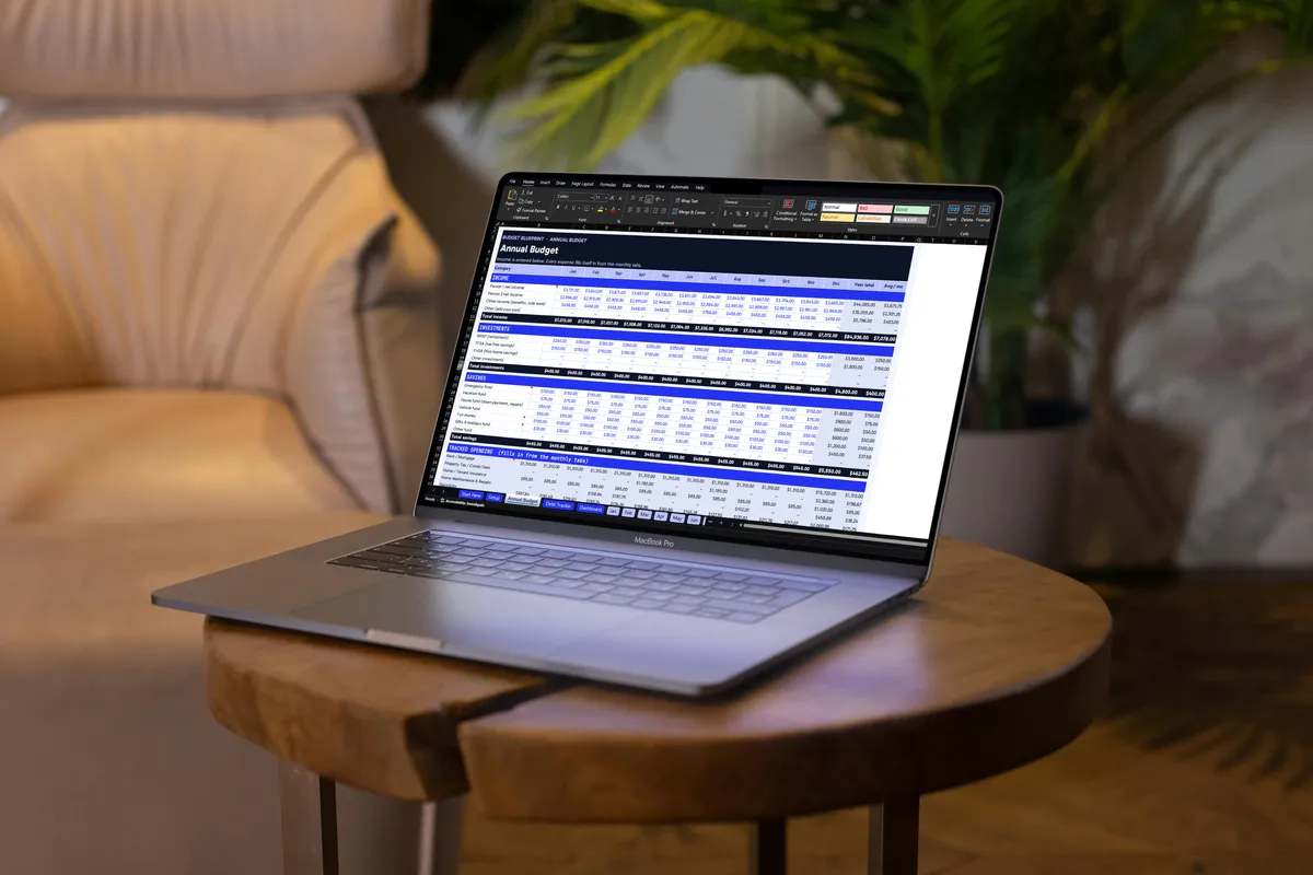 The Yearly Budget Planner spreadsheet shown on a laptop
